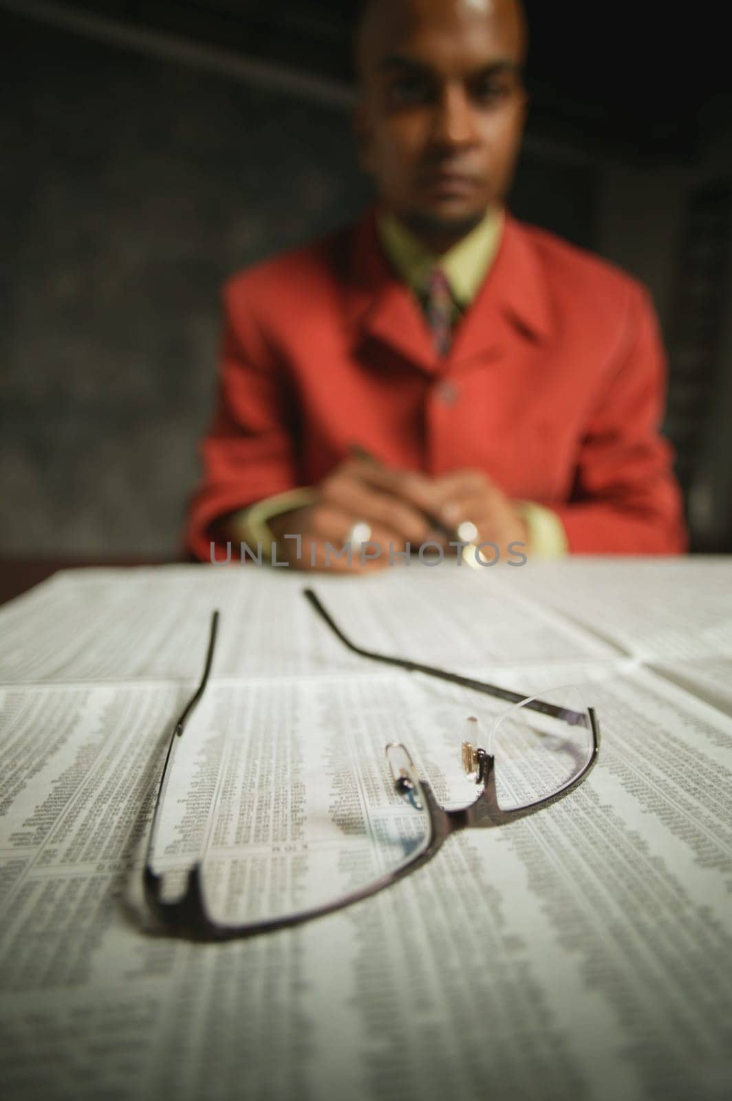 Businessman reads journal