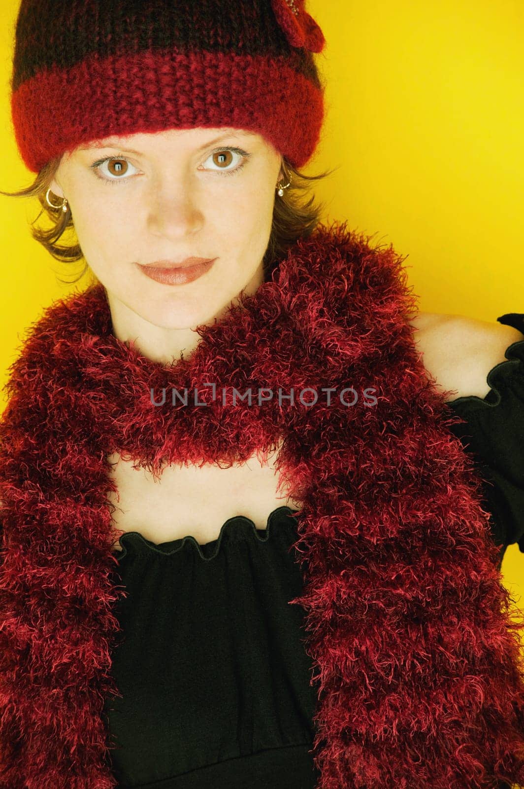 Female model wearing hat and scarf