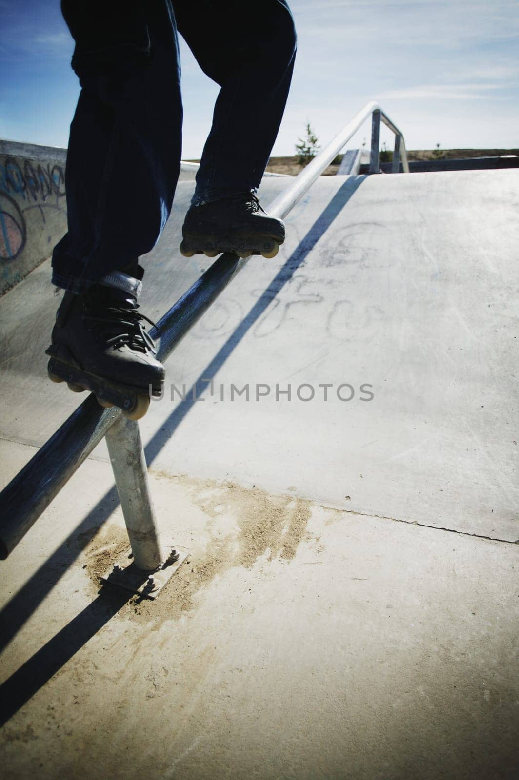 Skating down a rail
