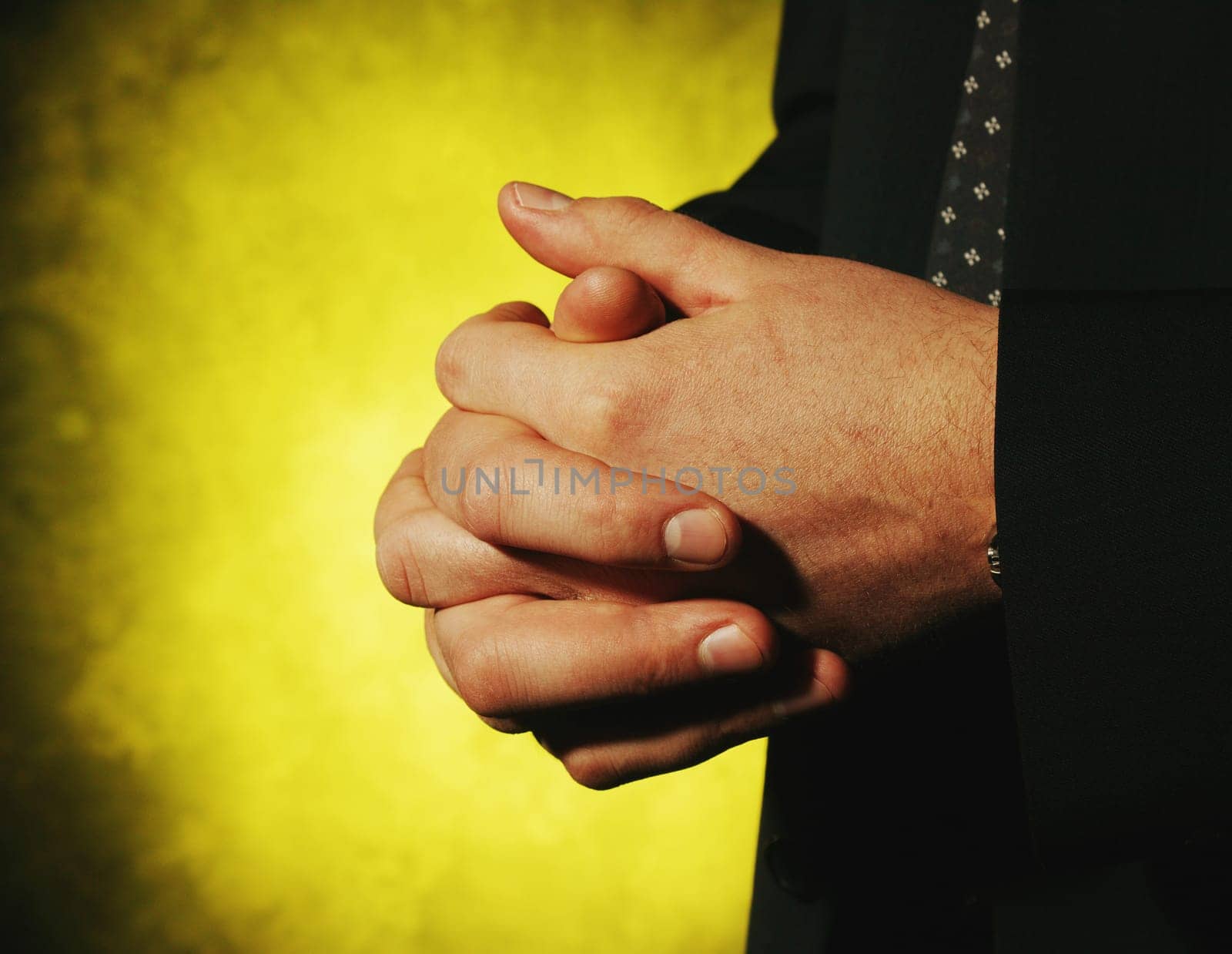 Man with folded hands