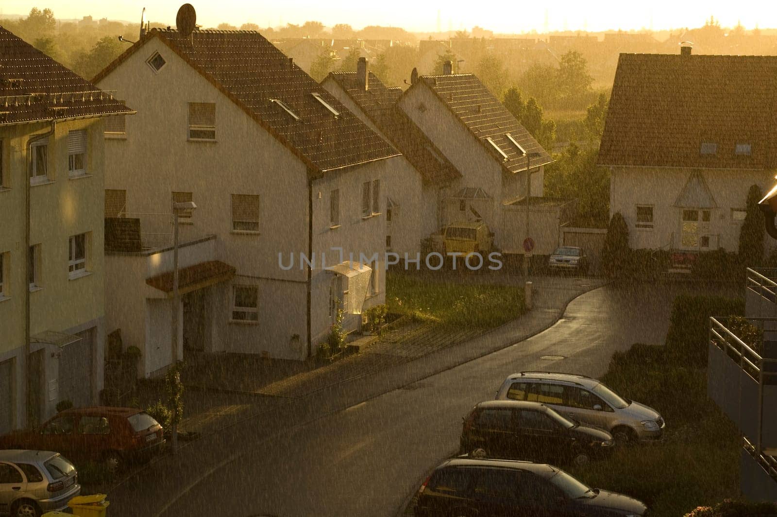 Summer rain backlit