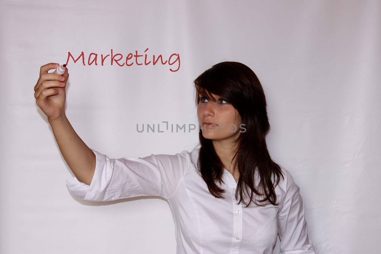 Young Woman Writing Marketing