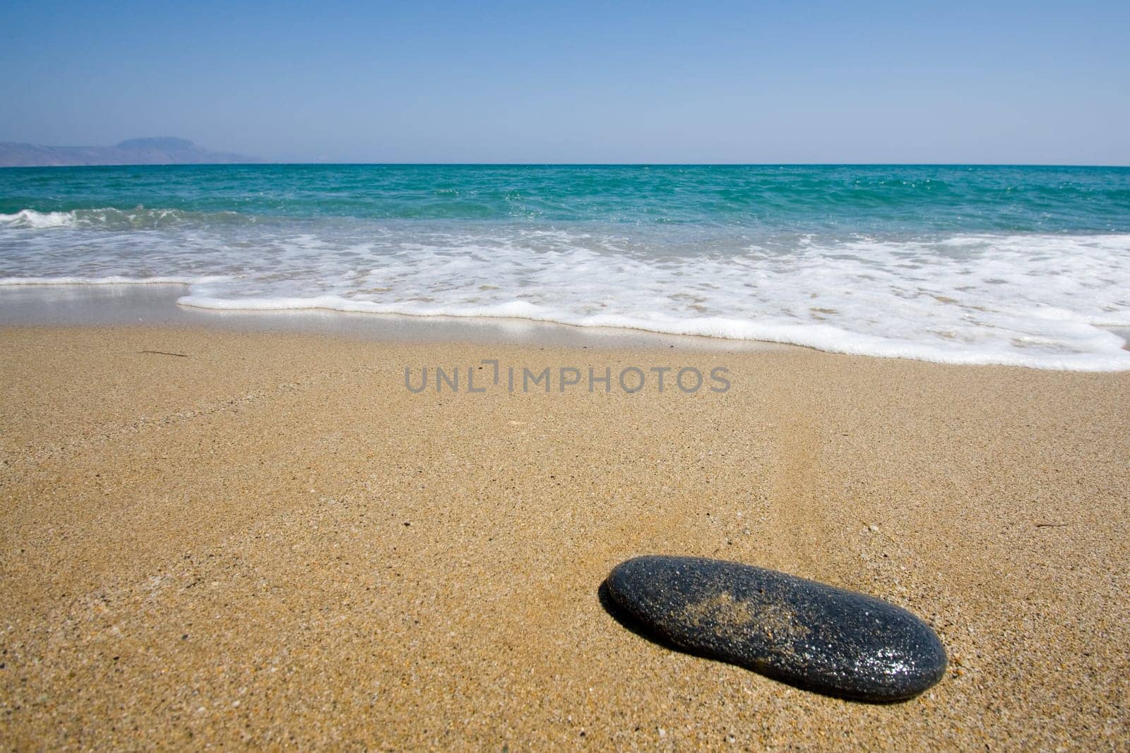 Beach with black stone