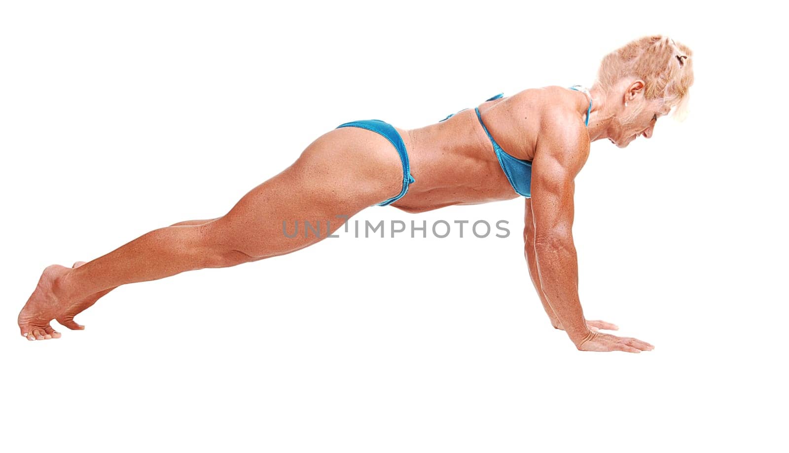 Woman doing pushups.