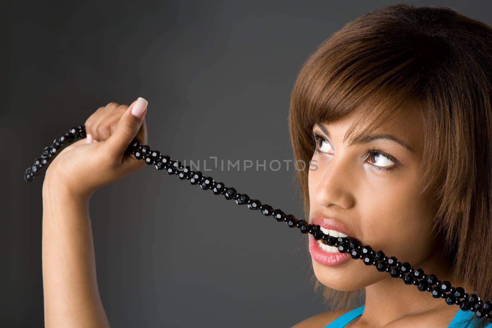 Young woman with pearl necklace