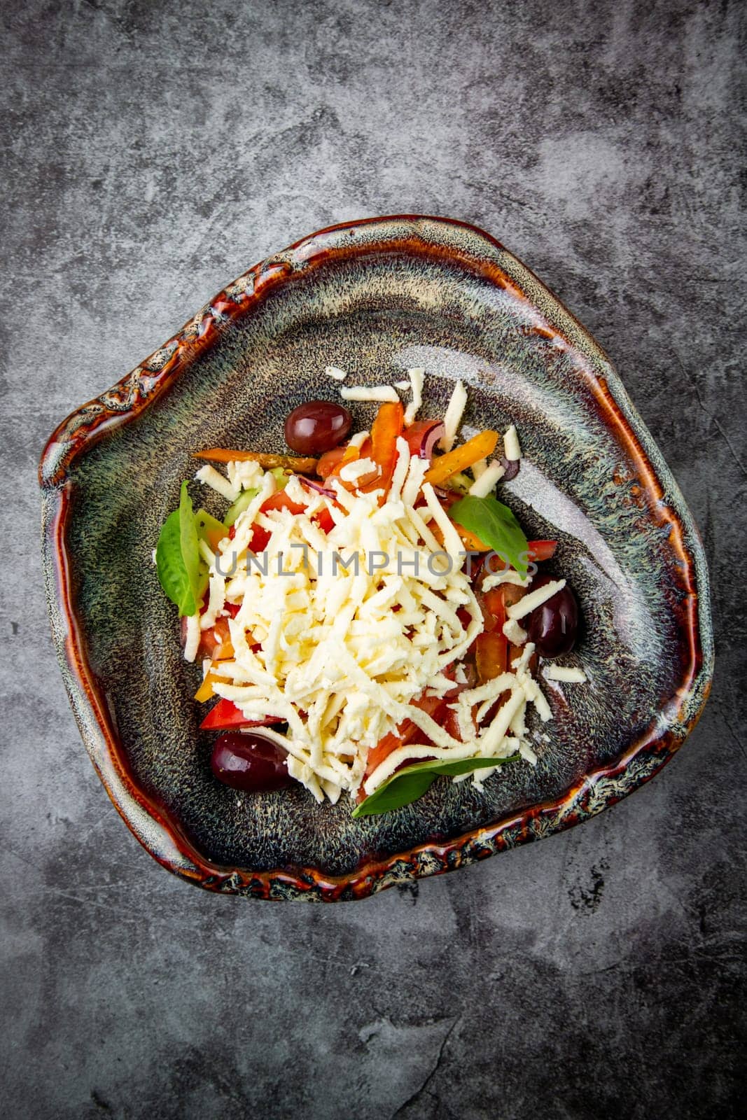 salad with tomatoes, basil, sweet peppers and cheese