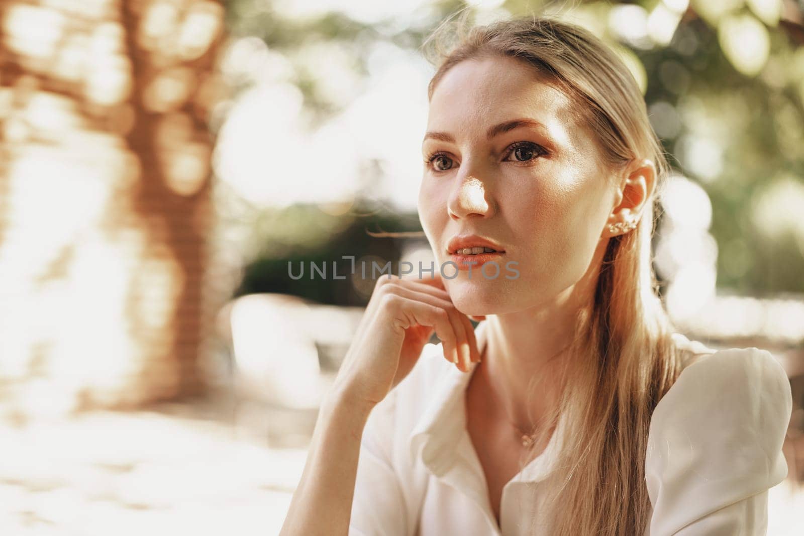 Close up portrait of young businesswoman outdoors by Fabrikasimf