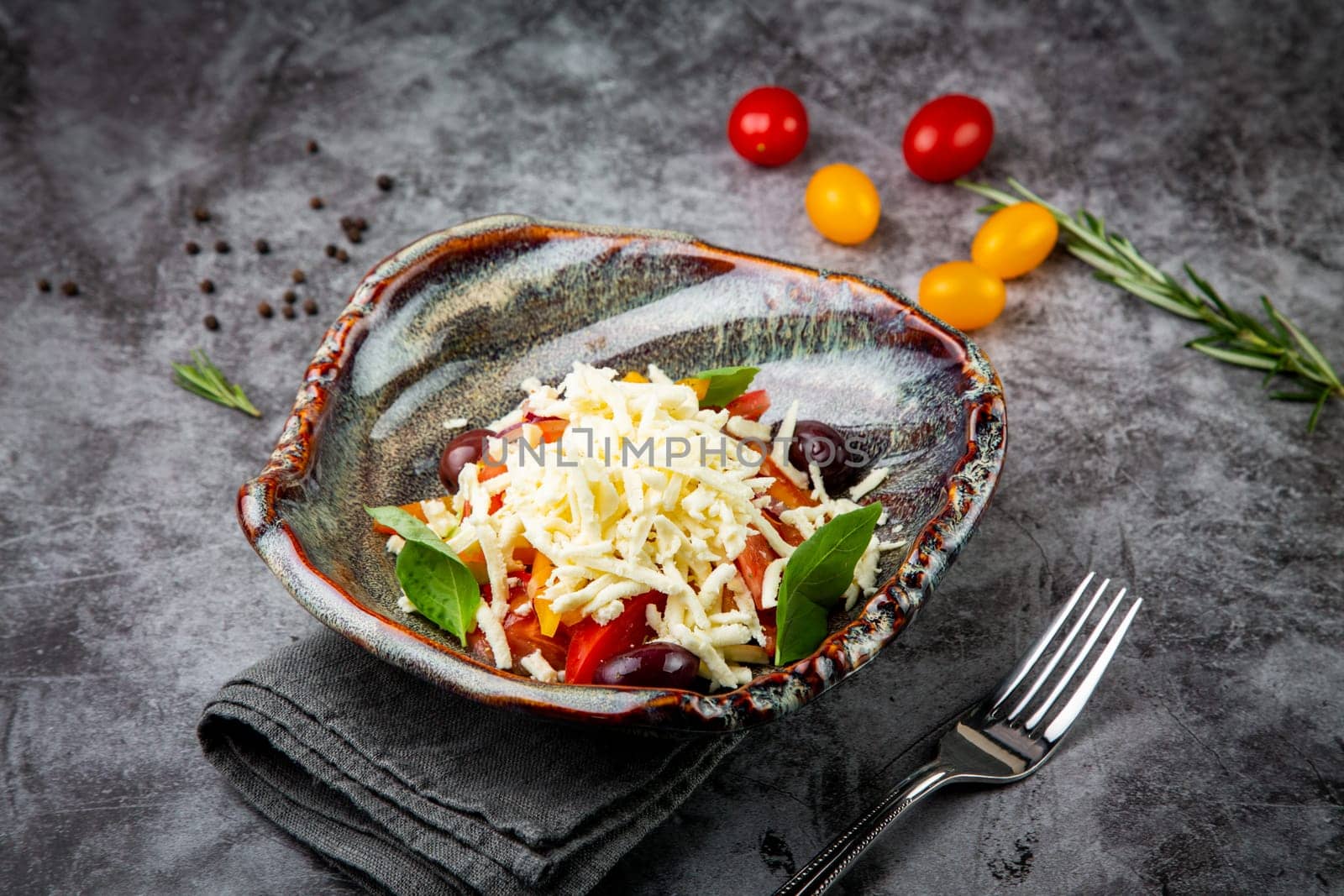 salad with tomatoes, basil, sweet peppers and cheese