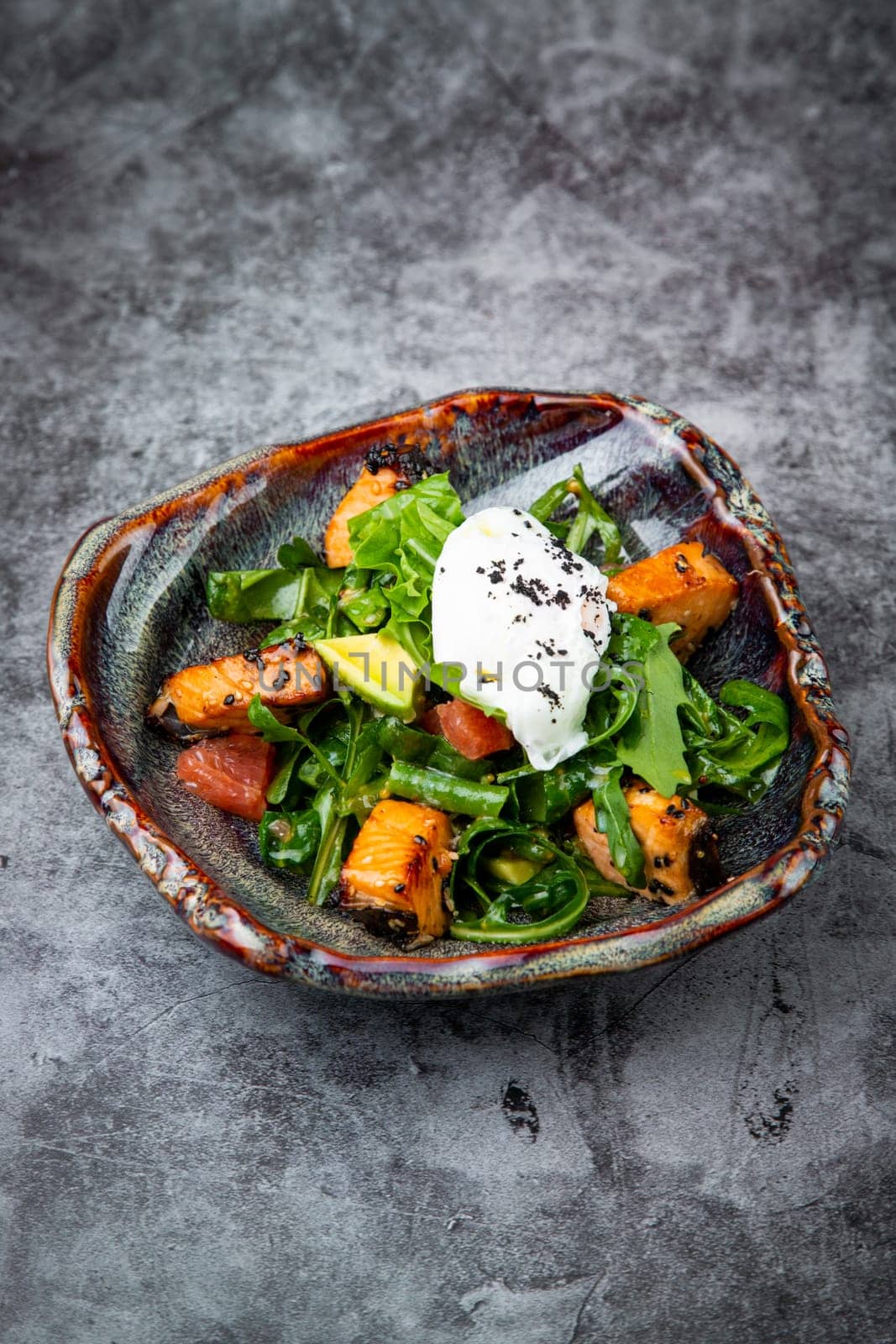 salad with red fish, herbs and lime