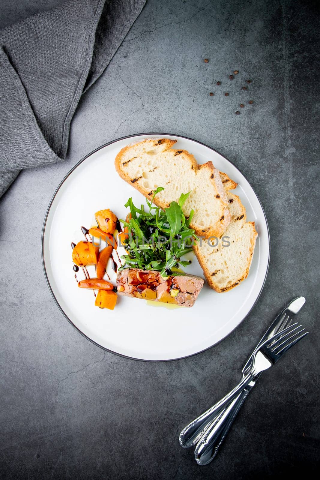 arugula with crusty bread and pate sauce, top view by tewolf