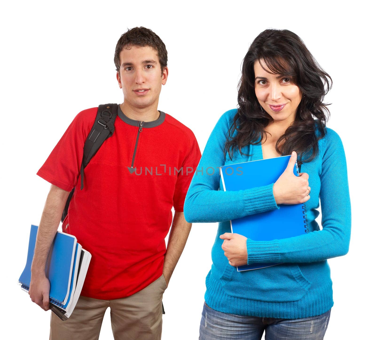 Two students with books and backpacks