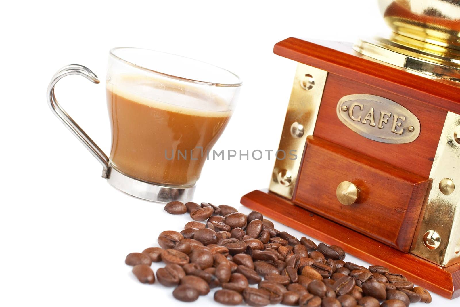 Cup, grinder, coffee pot and beans