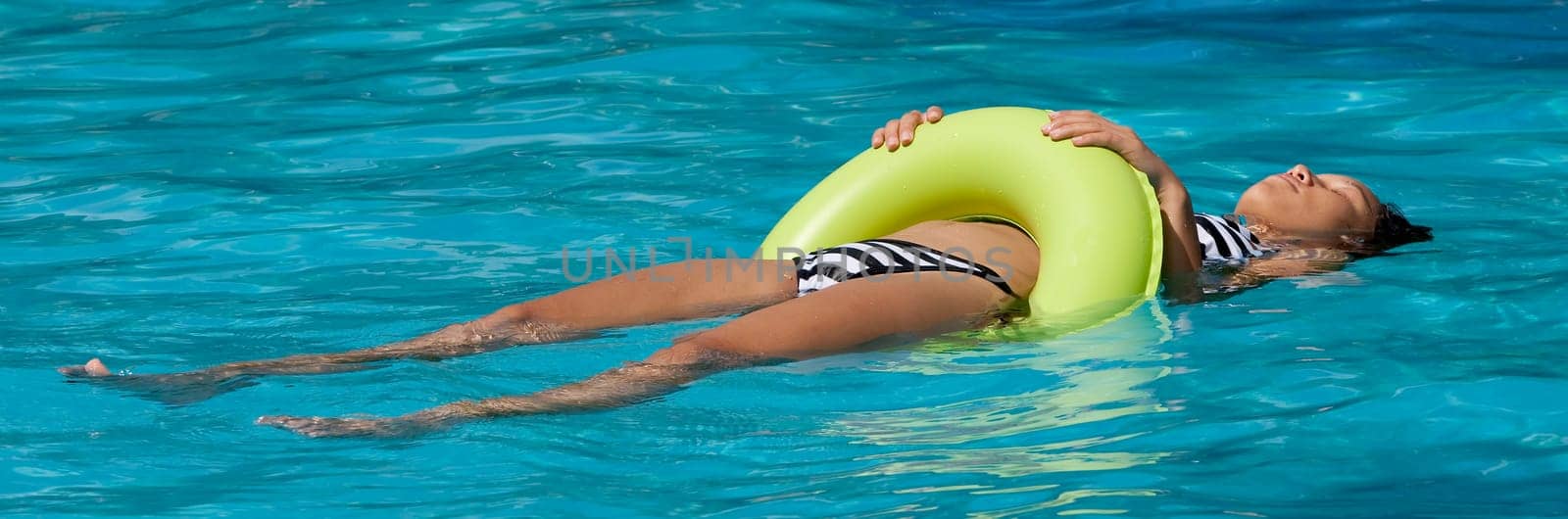 Sunbathing in the swimming pool