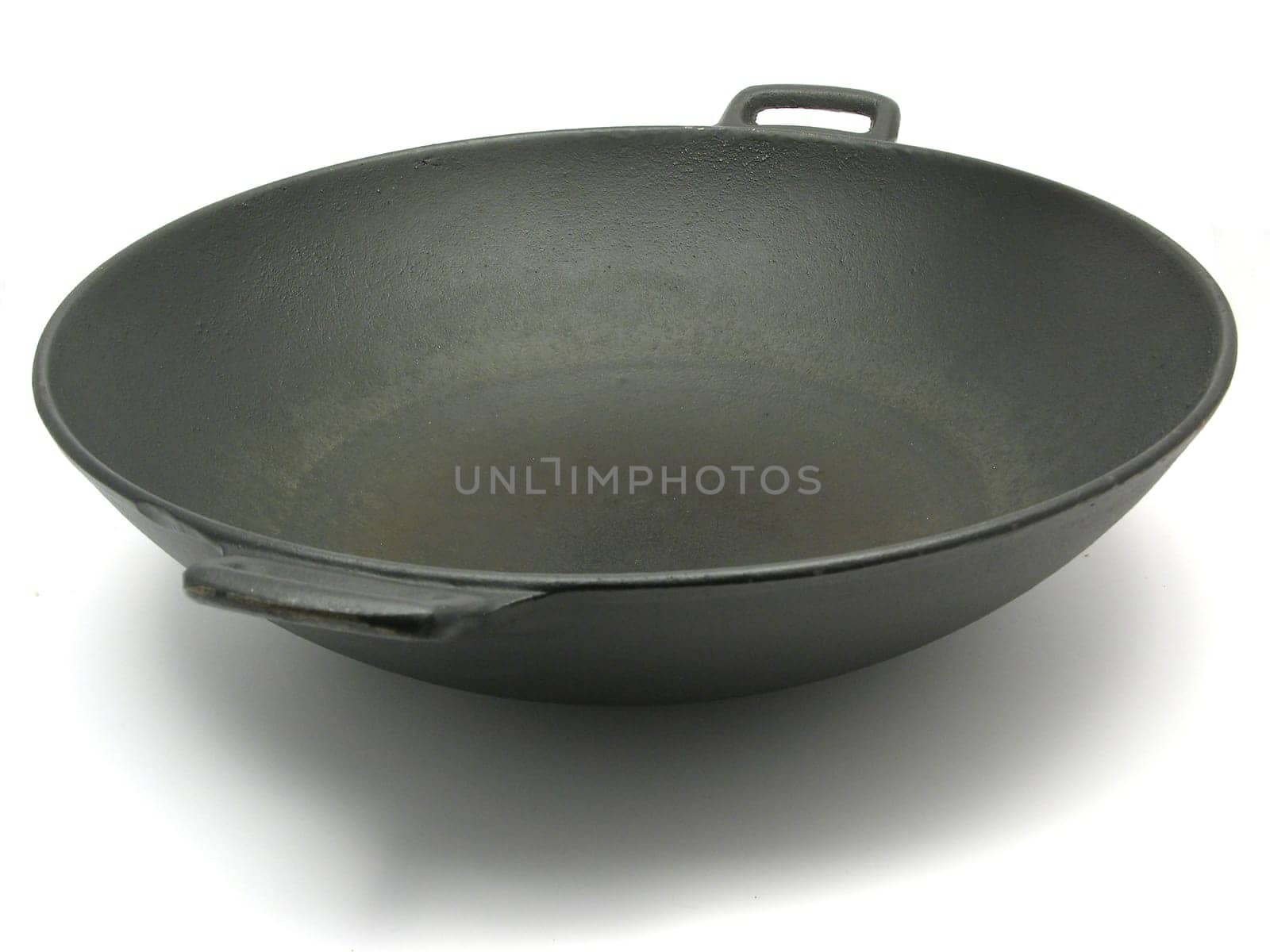 Wok against white background