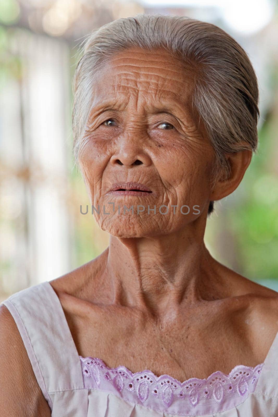 Portrait of old gray-haired woman,Asia