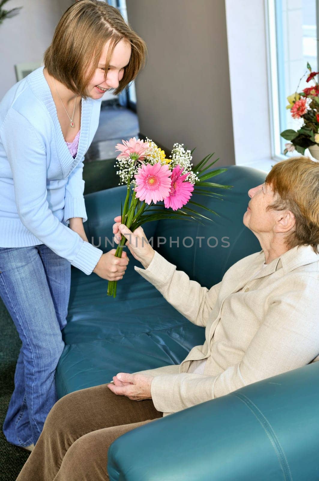 Granddaughter visiting grandmother
