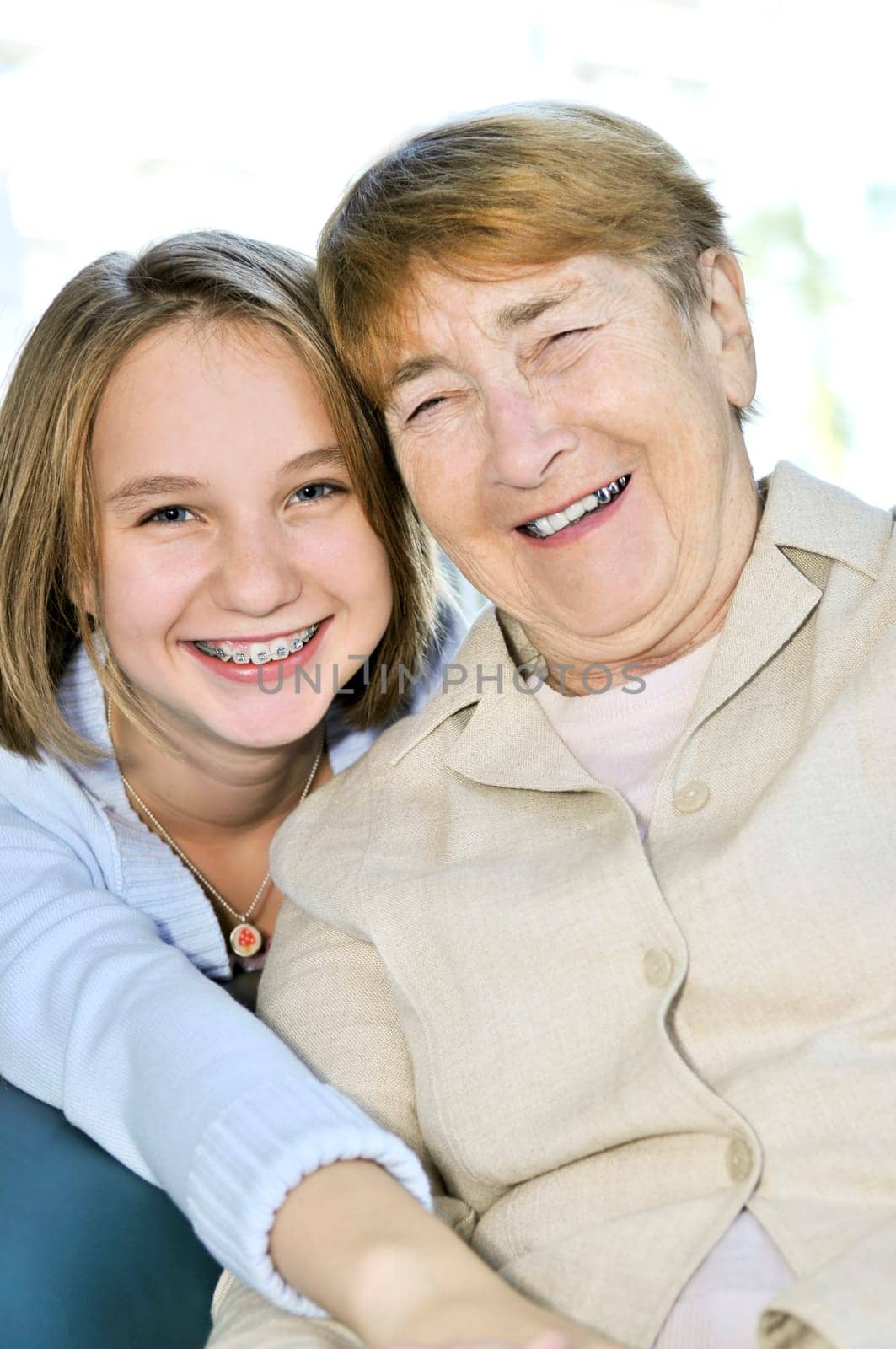 Granddaughter hugging grandmother