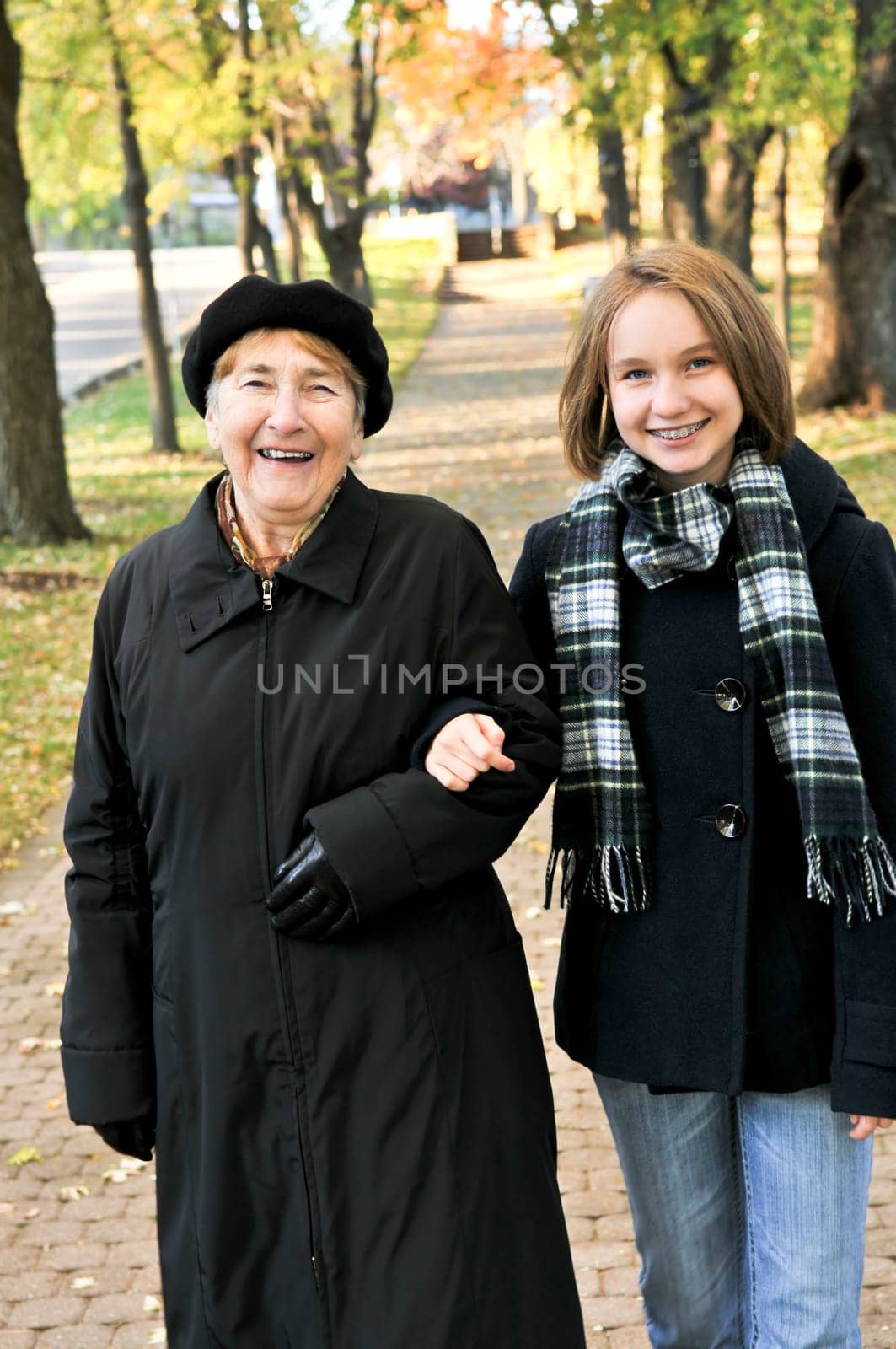 Granddaughter walking with grandmother