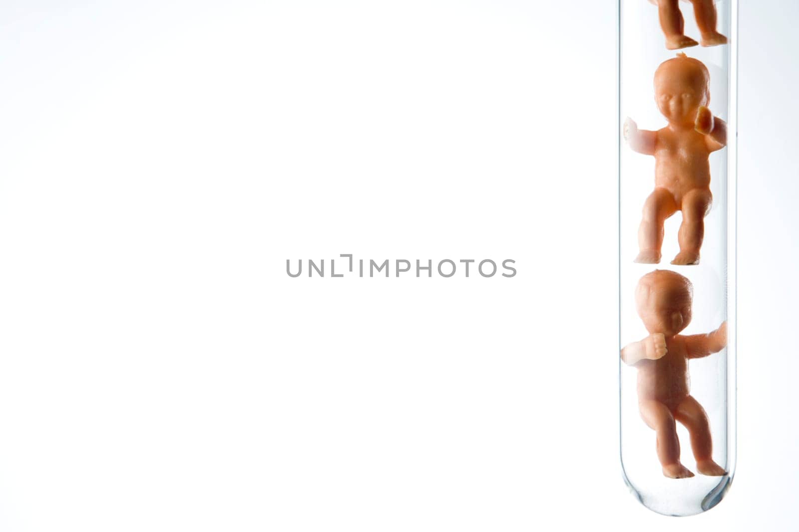 Plastic Babies In A Test Tube