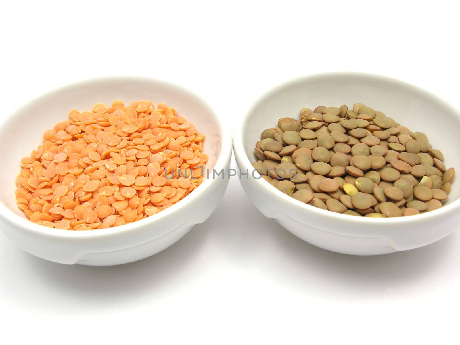 Two porcelain bowls with red lentils