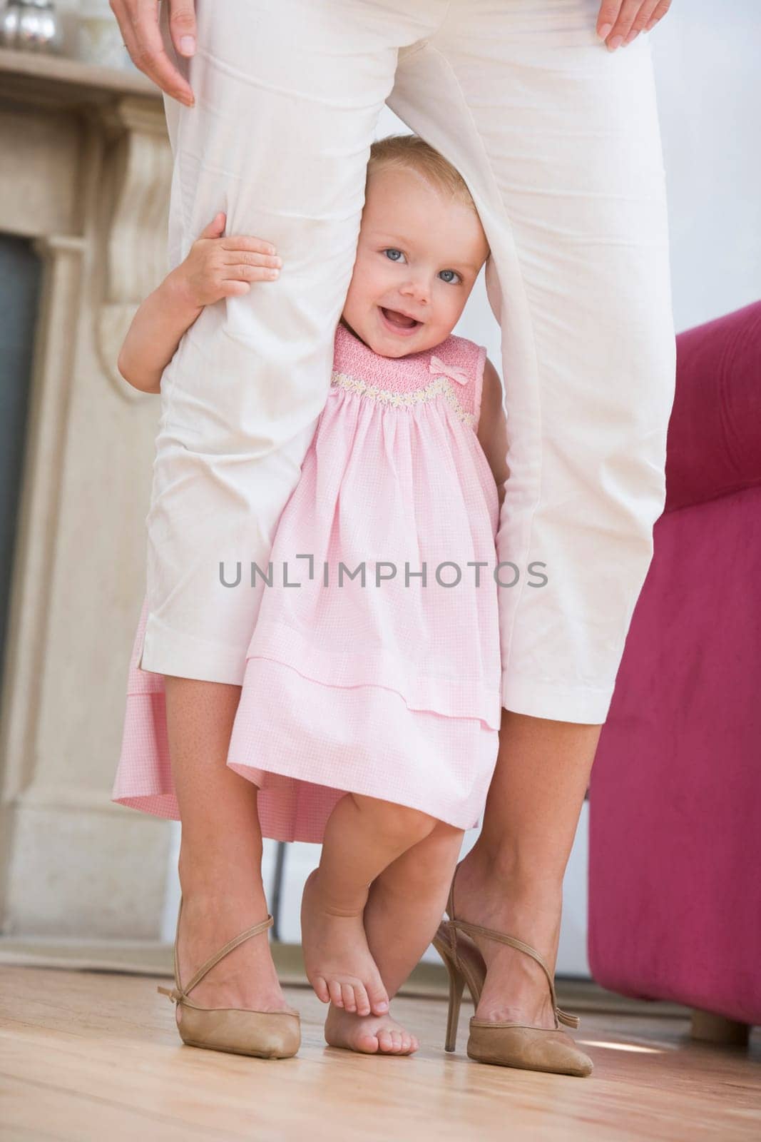 Mother in living room with baby