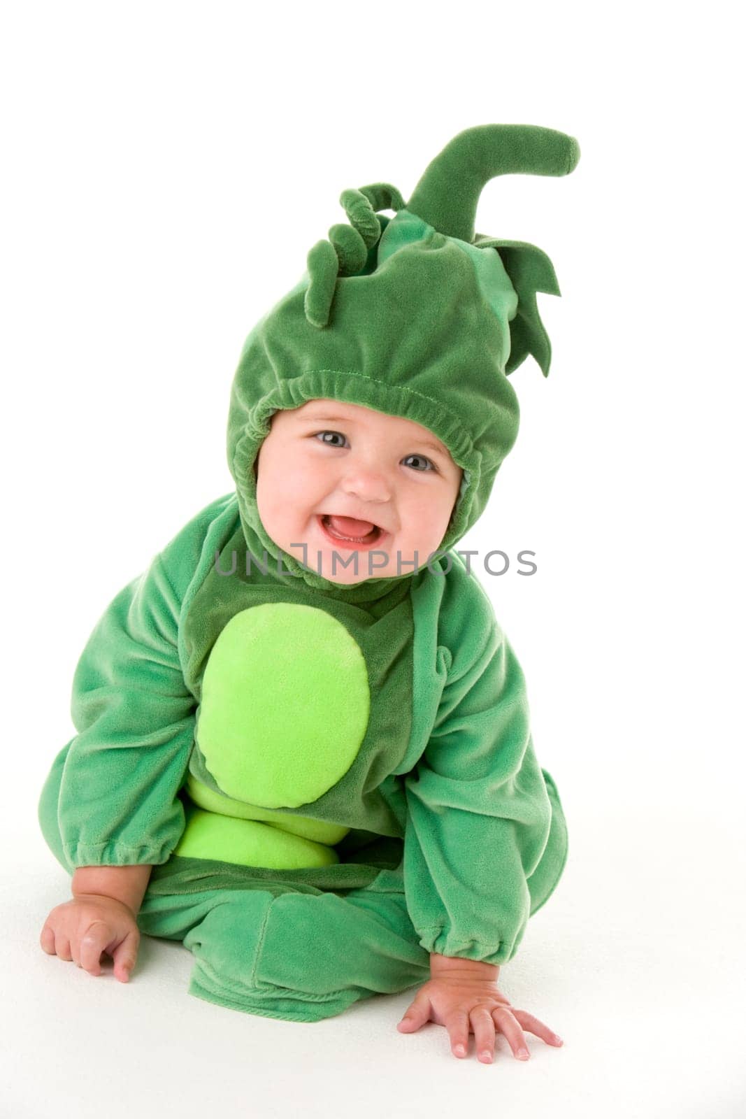 Baby in peas in pod costume smiling