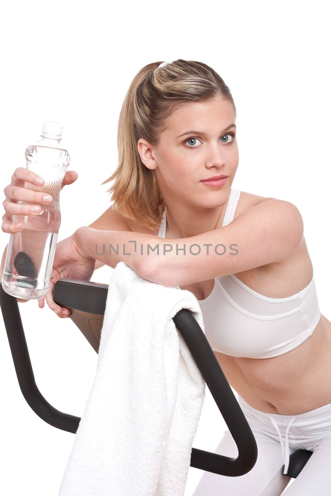 Fitness- woman on exercise bike