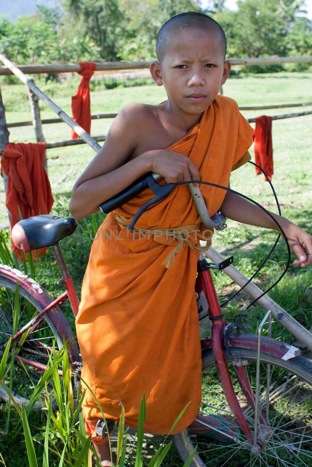 Buddhist monk on bicycle
