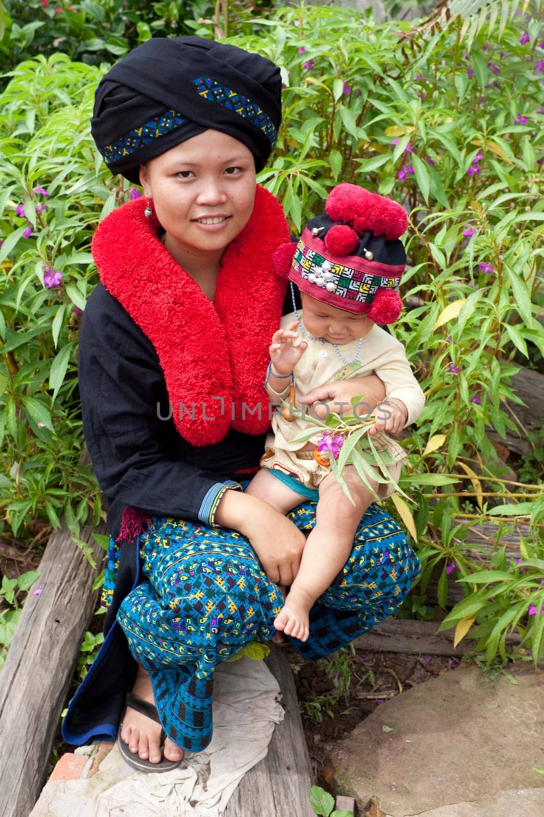 Asian woman with baby from Laos