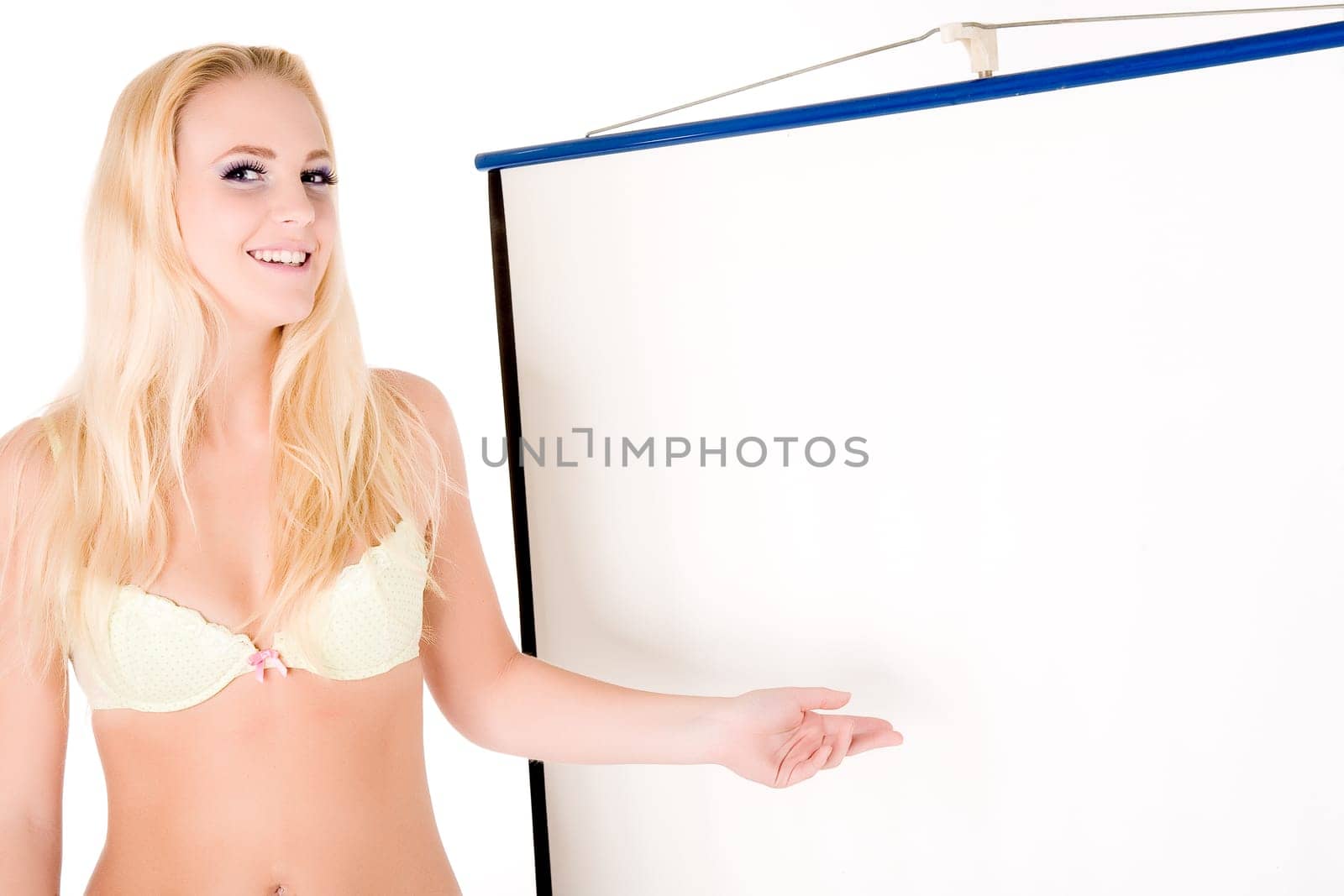 Yello lingery model presenting a white s