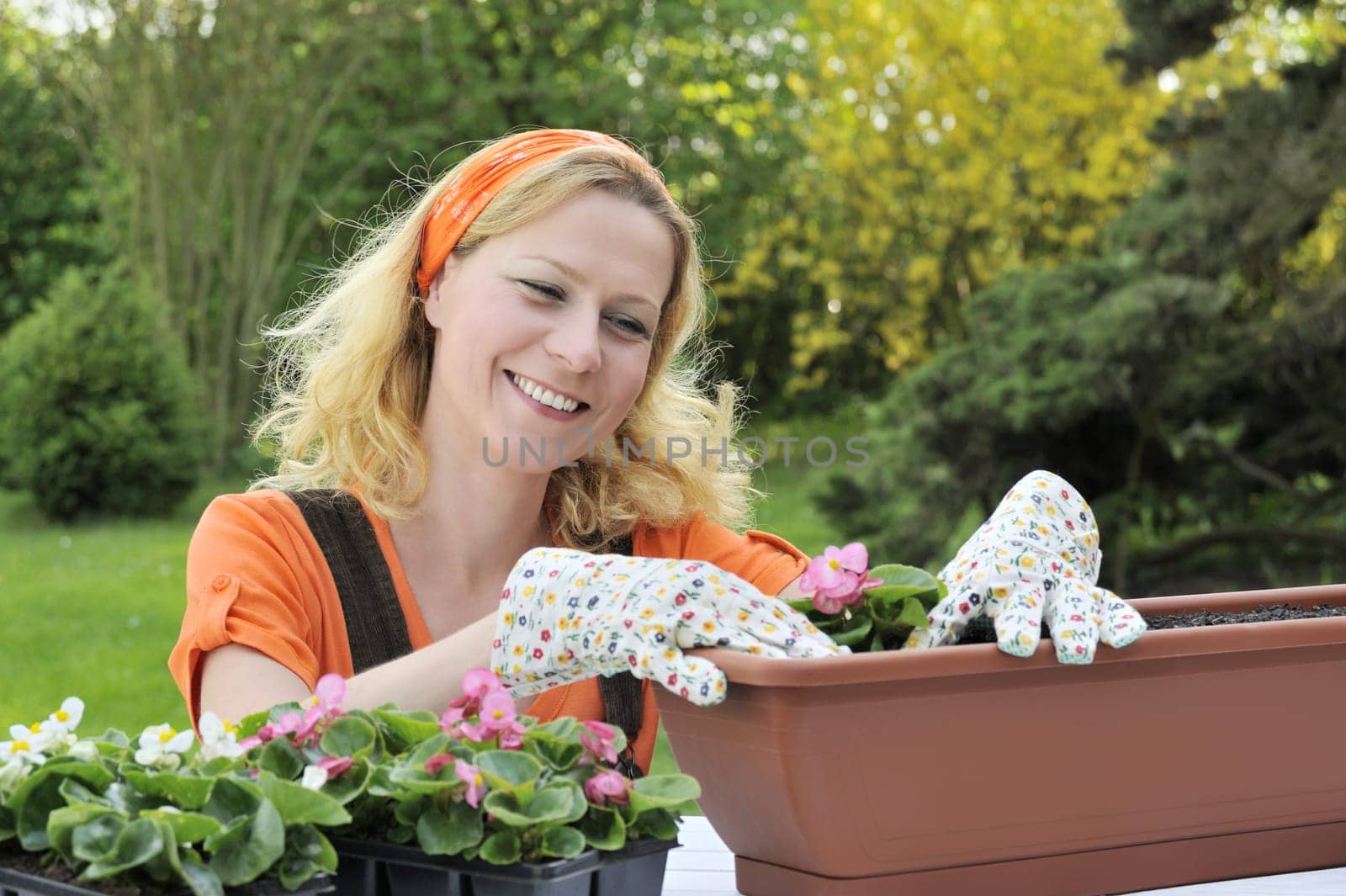 Woman planting flowers