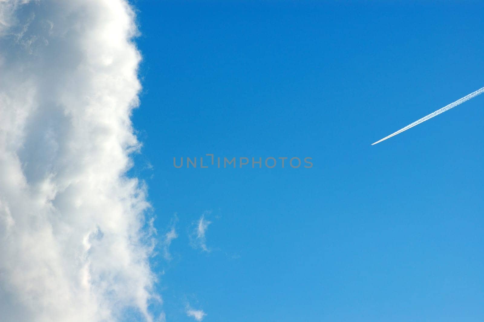 cloud and smoke trail