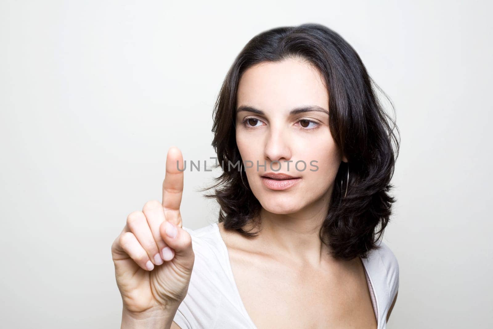 Woman presses on a virtual screen