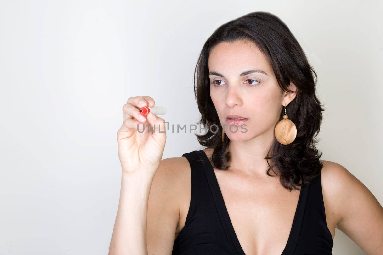 Woman writing on a virtual screen