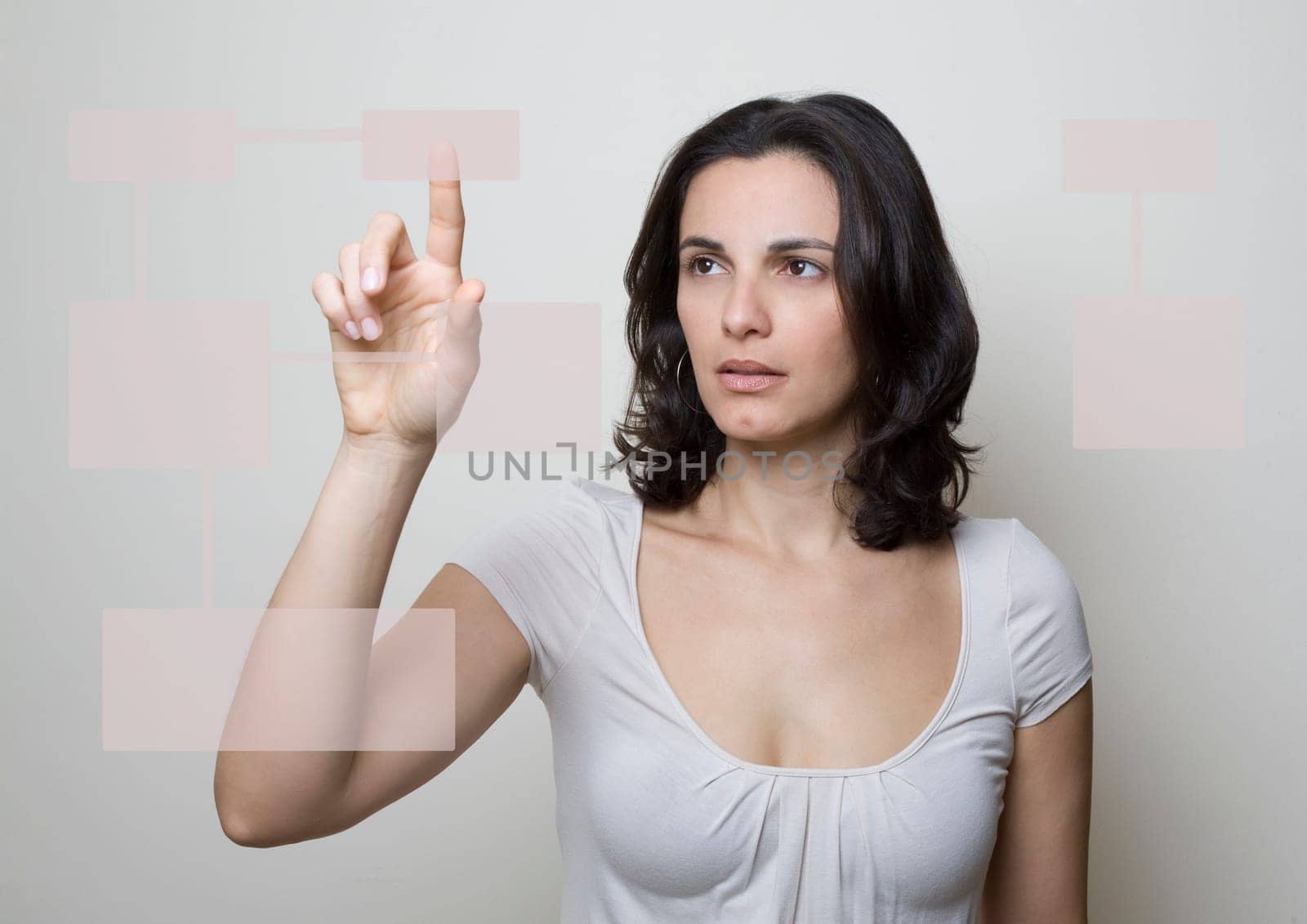 Woman presses on a virtual screen