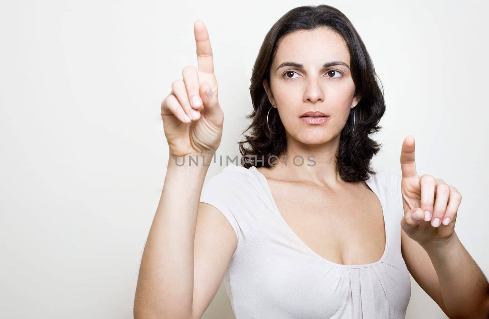 Woman presses on a virtual screen