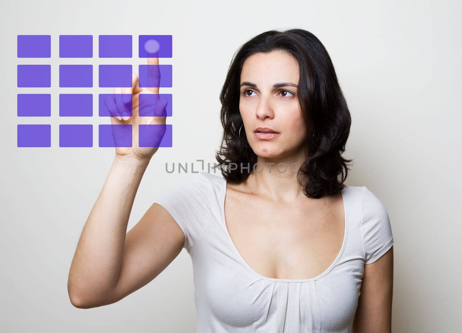 Woman presses on a virtual screen