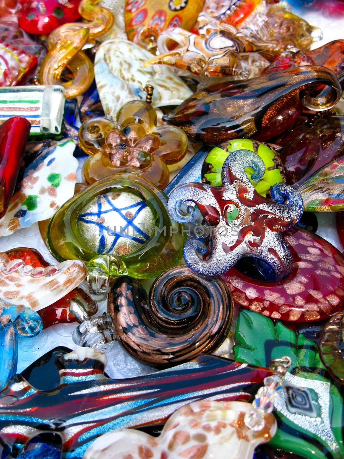 Different shaped glass decorations and pendants