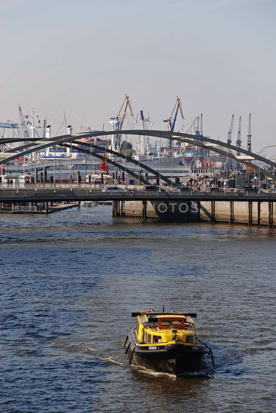 yellow tugboat in the port of Hamburg