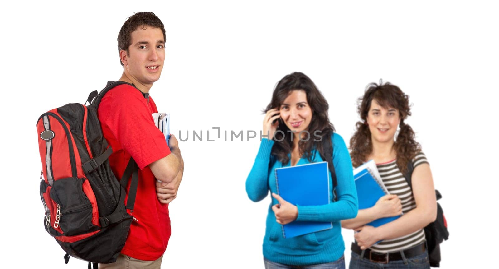 Three students with books and backpacks
