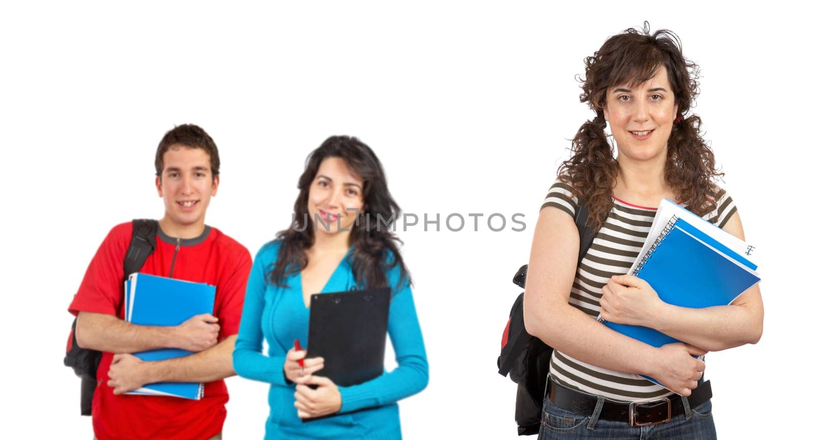 Three students with books and backpacks