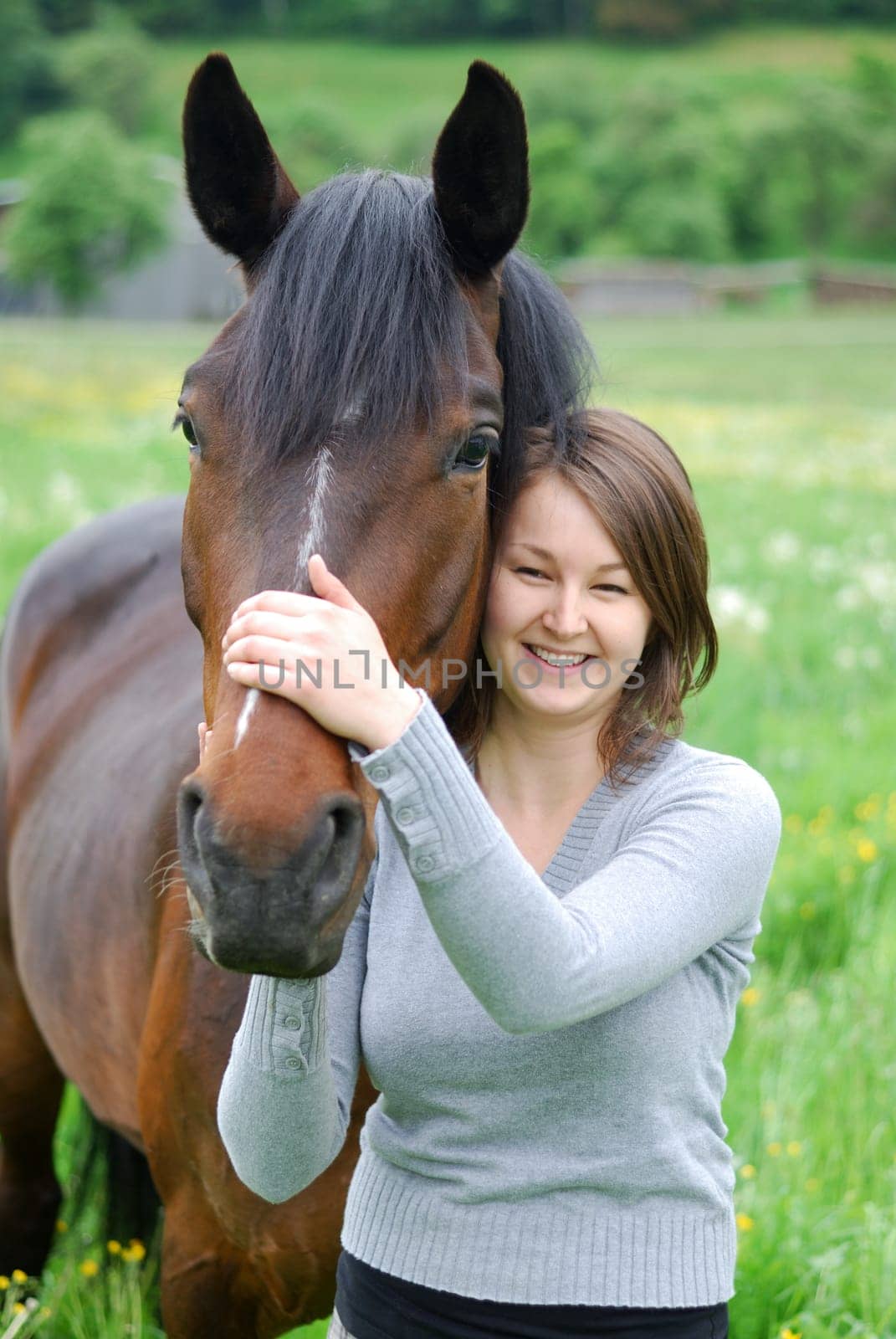 Young woman with horse