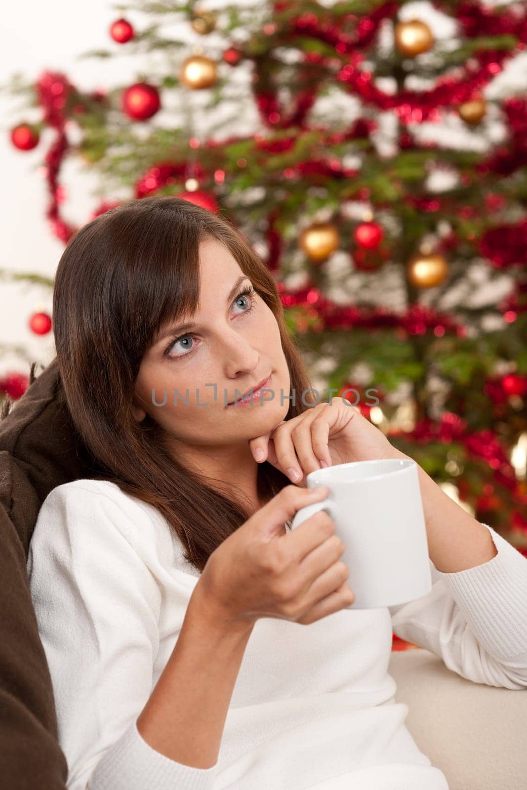 Woman with coffee on Christmas