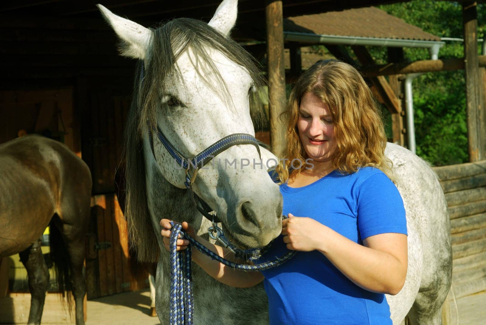 Young woman with horse