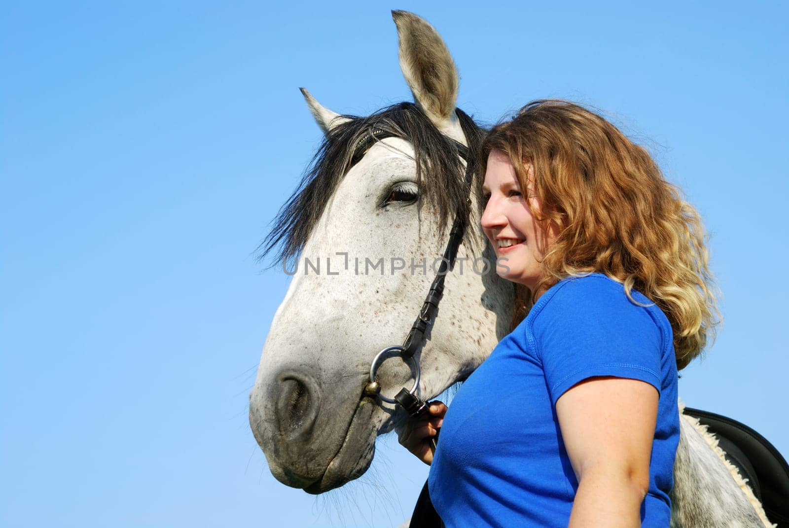 Young woman with horse
