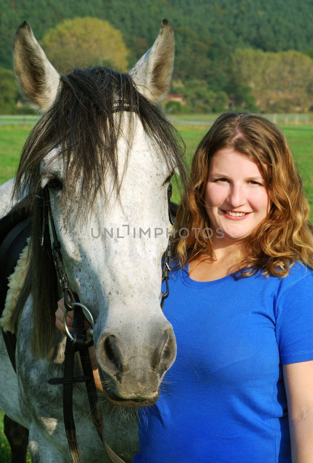 Young woman with horse