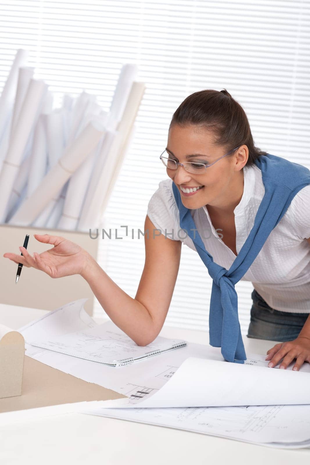 Brown hair female architect at the office