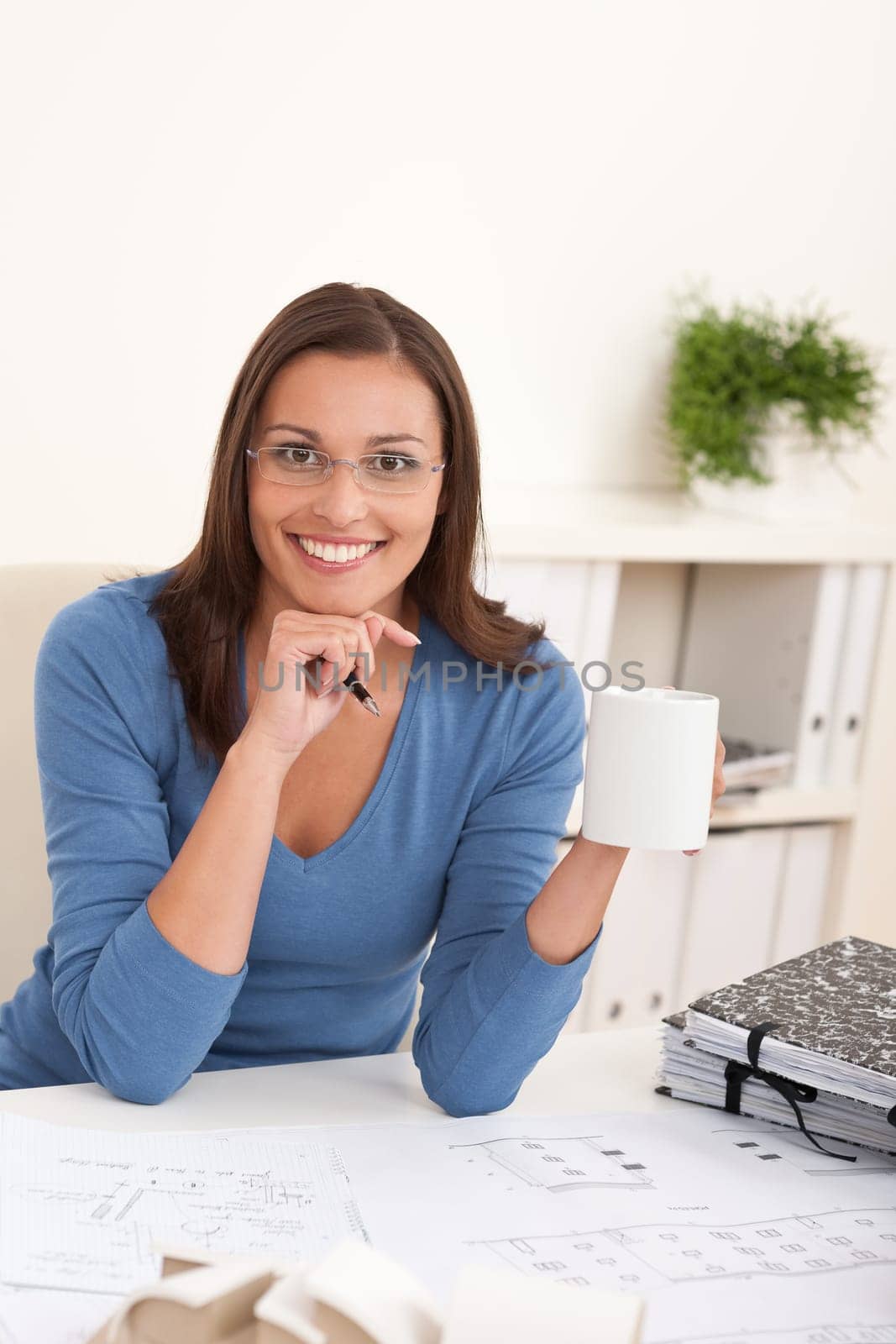 Brown hair female architect at the office