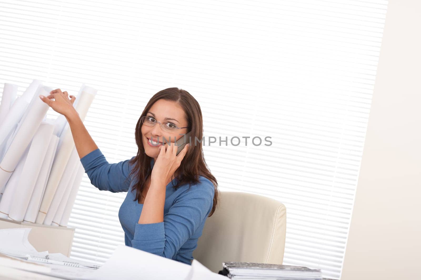 Brown hair female architect at the office