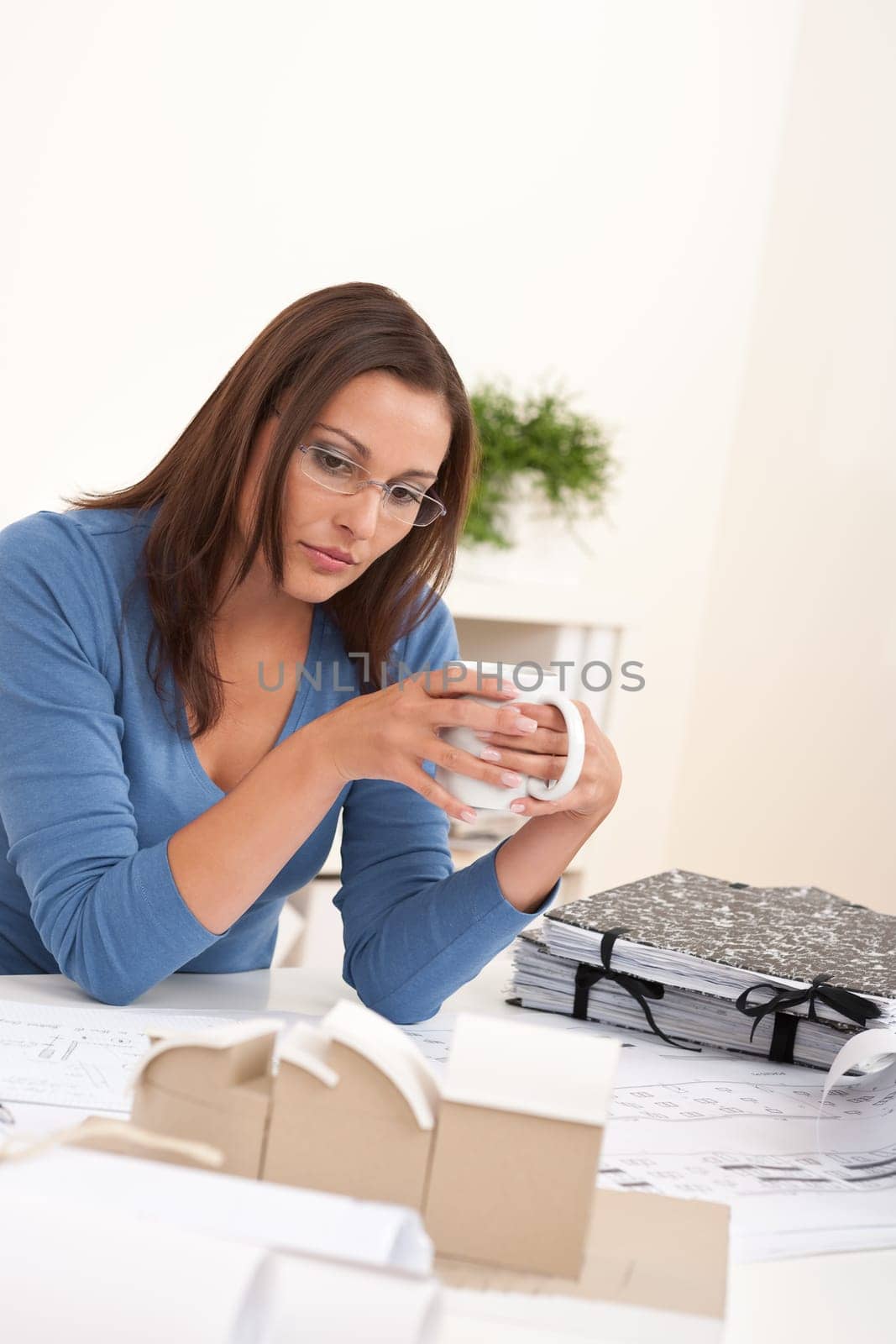 Brown hair female architect at the office